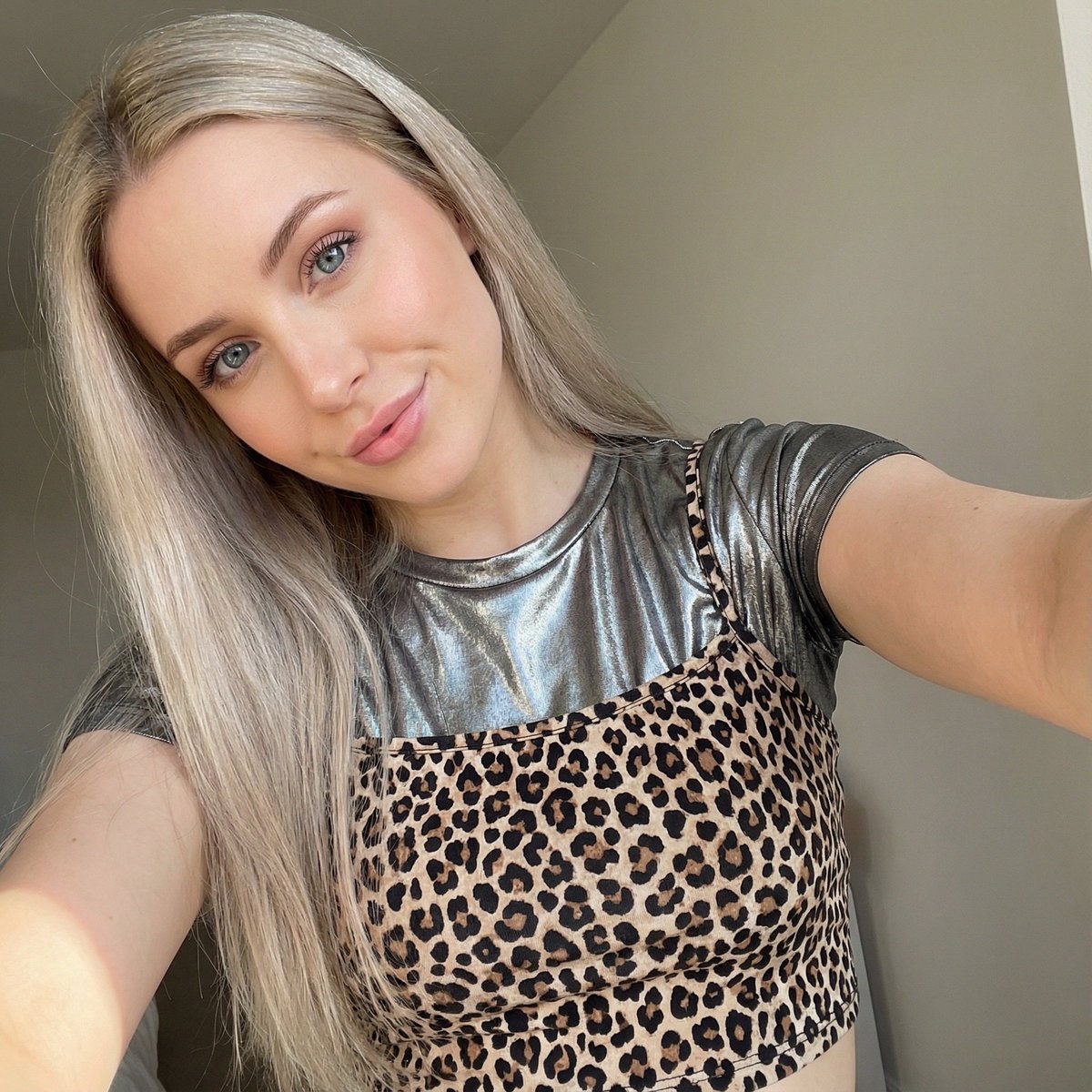 Profile / Avatar - Close-up Selfie of a Woman in Leopard Print and Metallic Shirt - Image 2